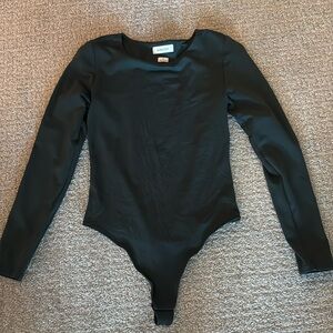 Green long sleeve Babaton contour crew bodysuit Aritzia
